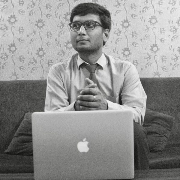 Amit Gaurav with Macbook